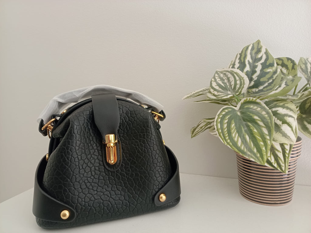Triangular crossbody bag